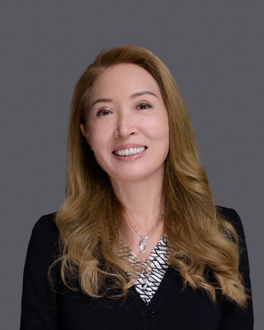 Portrait of Lisa Zhang, Property Sales Executive at DVELOP
